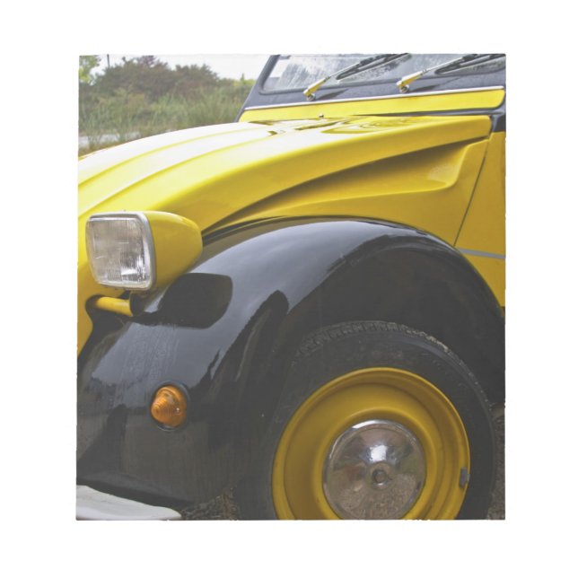An old black and yellow Citroen 2CV 2 CV, Notepad (Front)