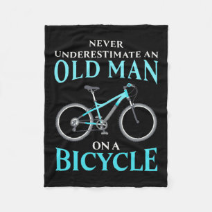 An Old Man On A Bicycle Fleece Blanket