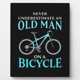 An Old Man On A Bicycle Plaque