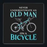 An Old Man On A Bicycle Square Wall Clock<br><div class="desc">An Old Man On A Bicycle</div>