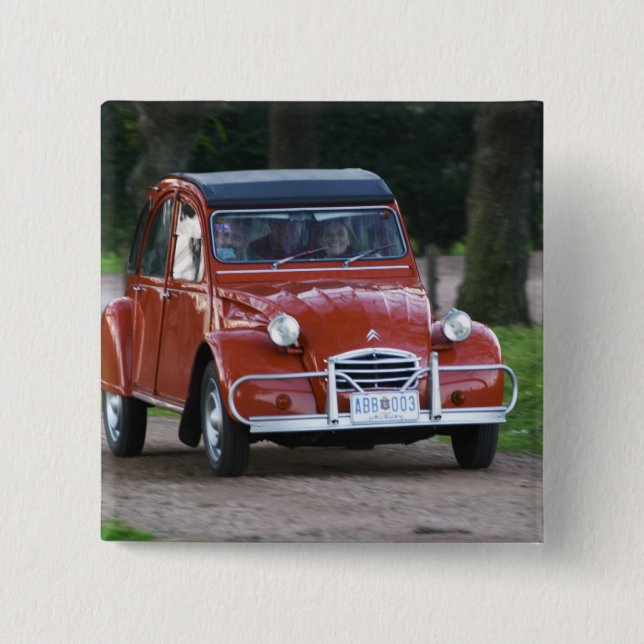 An old red Citroen 2CV car with a smiling woman 15 Cm Square Badge (Front)