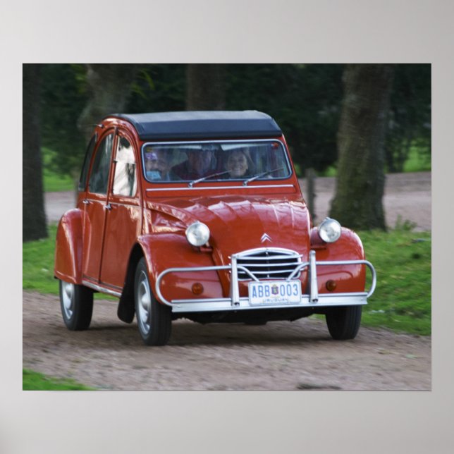 An old red Citroen 2CV car with a smiling woman Poster (Front)