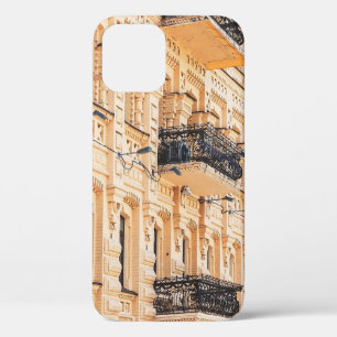 An old yellow house with wrought-iron balconies. f iPhone 12 case