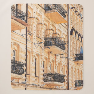 An old yellow house with wrought-iron balconies. f sherpa blanket