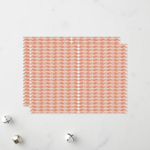 an orange and white pattern on a white background holiday card