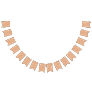an orange and white striped background with small bunting