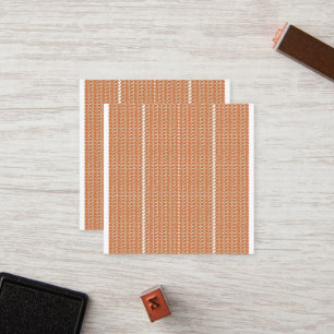  an orange and white striped background with small loyalty card