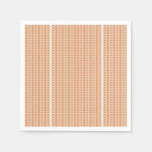 an orange and white striped background with small napkin