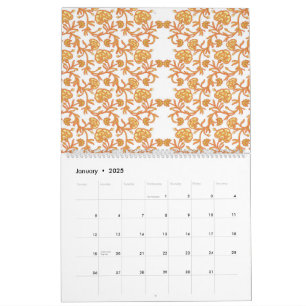 an orange and white wallpaper with a floral design calendar