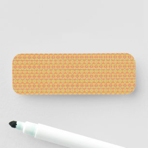 an orange and yellow background with a pattern name tag
