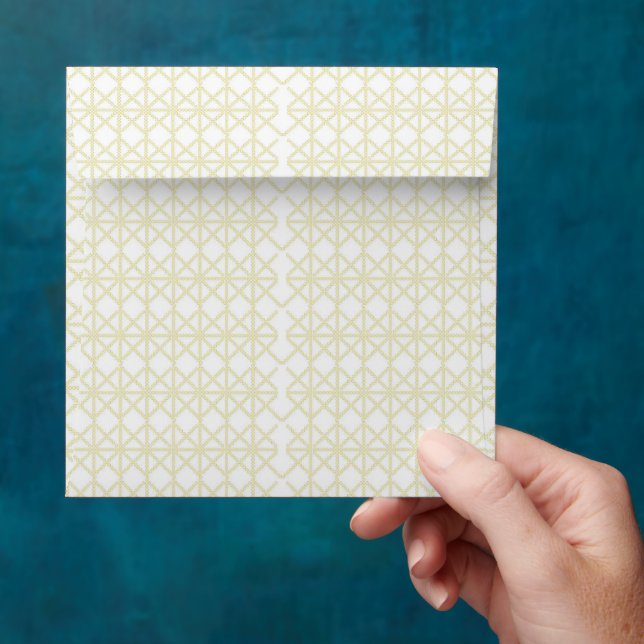 an orange and yellow background with small dots envelope (Hand)