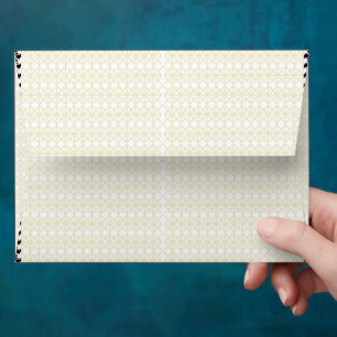 an orange and yellow background with small dots envelope