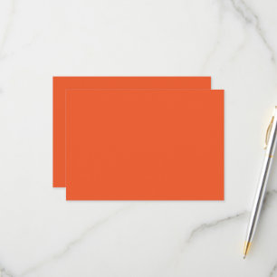 an orange background with a RSVP card