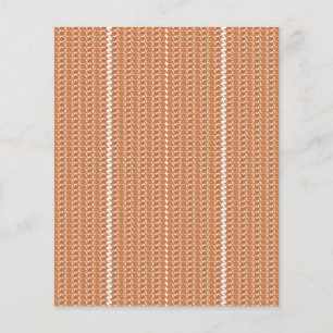 An orange rug with a textured pattern lies flat on flyer