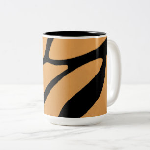 an orange surface with irregular black lines Two-Tone coffee mug