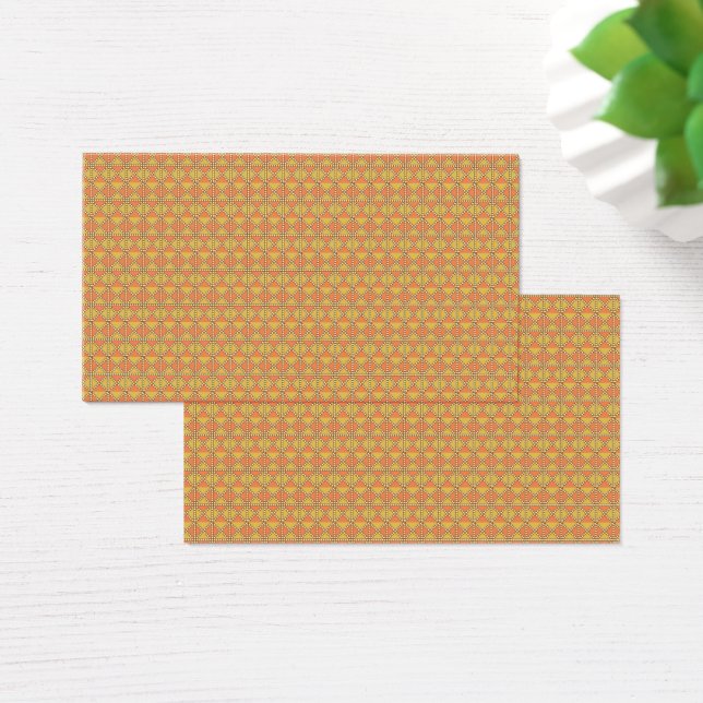 An orange, yellow, and brown symmetrical pattern w (Desk)