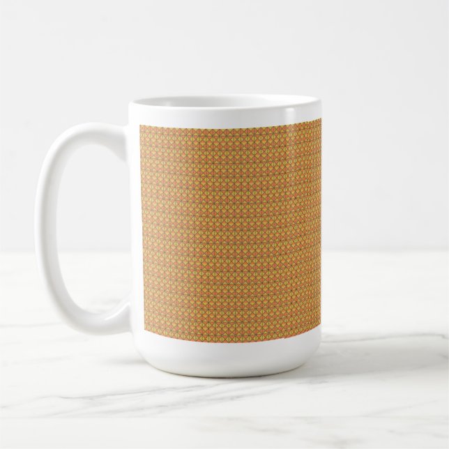 An orange, yellow, and brown symmetrical pattern w coffee mug (Left)