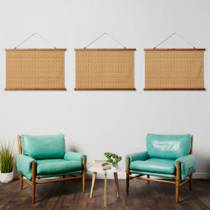 An orange, yellow, and brown symmetrical pattern w hanging tapestry