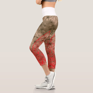 An ornate design with a harmonious mix of red and capri leggings