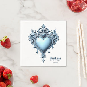 An ornate light blue archway with floral accents, napkin