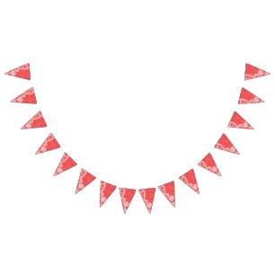 An ornate paisley design featuring rich red and bl bunting