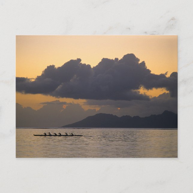 An outrigger canoe team practices off the coast postcard (Front)