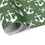 Anchors with Christmas Lights Nautical Wrapping Paper<br><div class="desc">Add a nautical touch to your Christmas gifts with this patterned wrapping paper. This gift wrap features illustrations of boat anchors in white wrapped with Christmas lights with additional Christmas bulb accents against a green background.</div>