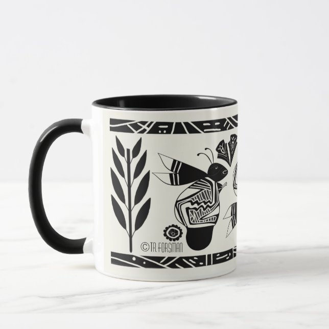 Ancient bees and flowers on cream mug (Left)