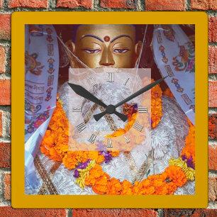 Ancient Buddha with Flower offerings, Nepal Square Wall Clock