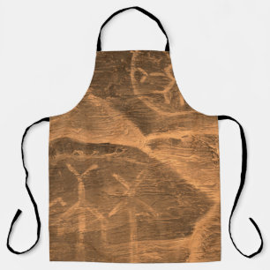 ancient design on the cave wall. history of antiqu apron
