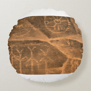 ancient design on the cave wall. history of antiqu round cushion
