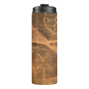 ancient design on the cave wall. history of antiqu thermal tumbler