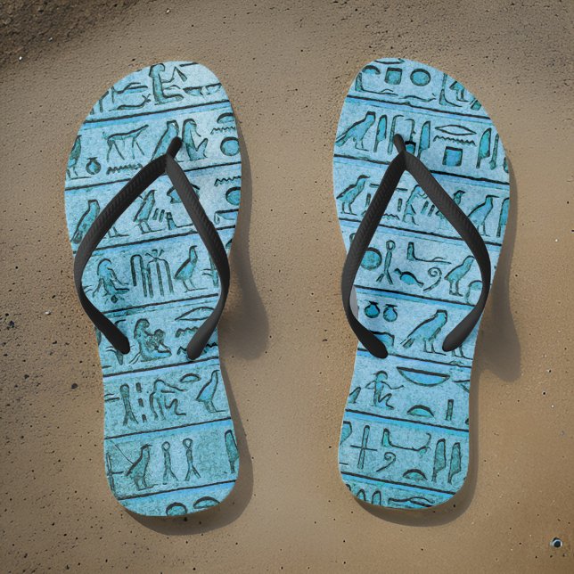 Ancient Egyptian Hieroglyphs Blue Thongs (Walk like an ancient Egyptian in our stylish flip flops! 👣💙 #HieroglyphicChic #SummerVibes)