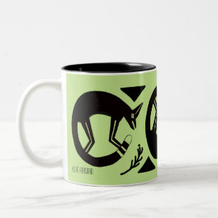 Ancient foxes  and flowers on lite green mug