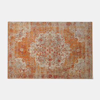 Ancient orange oriental carpet doormat