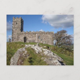 ancient stone church and windswept tree postcard