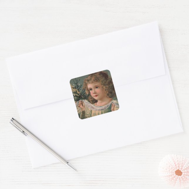 Angel Holding a Tiny Candlelit Christmas Tree Square Sticker (Envelope)