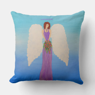 Angel in purple gown holding a spring bouquet . cushion