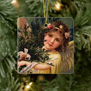 Angel with an Armful of Christmas Greenery Ceramic Ornament