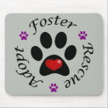 Animal Rescue Mouse Pad<br><div class="desc">This mouse pad supports animal rescue, adoption and fostering. A cute paw print with a red heart inside surrounded by the words adopt, foster and rescue separated by purple paw prints. Great gift or could be used by animal shelters as a raffle item or in a silent auction or a...</div>