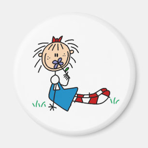 Annie Lying In Grass With Flower Magnet