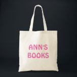 ANN'S BOOKS in Pink Customisable on Tote Bag<br><div class="desc">"ANN'S BOOKS" in pink lettering. You can change the text,  too.</div>