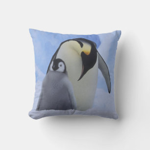 Antarctica. Emperor penguins and chick Cushion