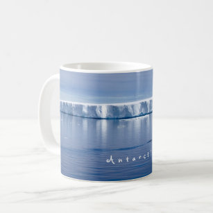 Antarctica iceberg landscape photo with white text coffee mug