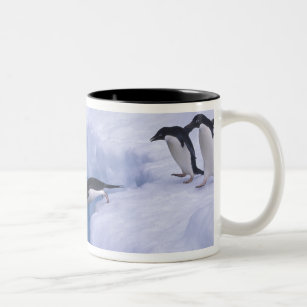 Antarctica, Paulet Island. Adelie penguins dive Two-Tone Coffee Mug