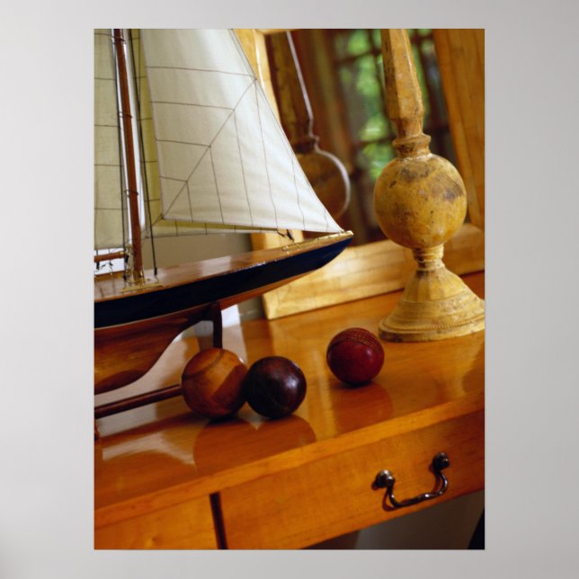 Antique Baseballs On A Table By A Model Sailboat Poster (Front)