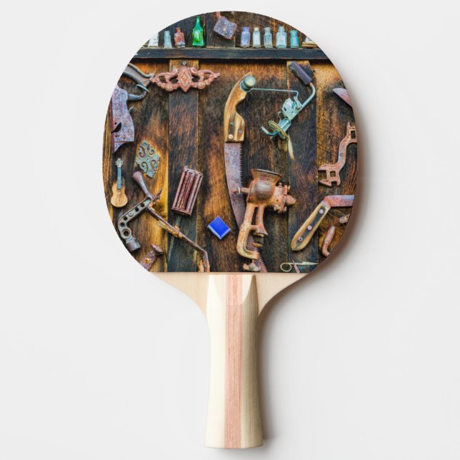 Antique collection on wall ping pong paddle (Front)