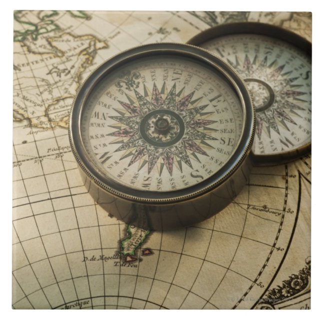 Antique compass on map tile (Front)