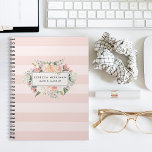 Antique Floral Blush Pink Stripe Notebook<br><div class="desc">Keep track of your appointments, customer data and more with our chic floral notebook. Design features a tone on tone pastel blush pink striped background with your name and/or business name on a watercolor floral badge with clusters of blush pink, peach and cream rose and peony flowers. Perfect for salons,...</div>
