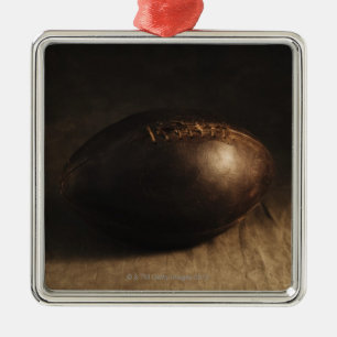 Antique football metal ornament